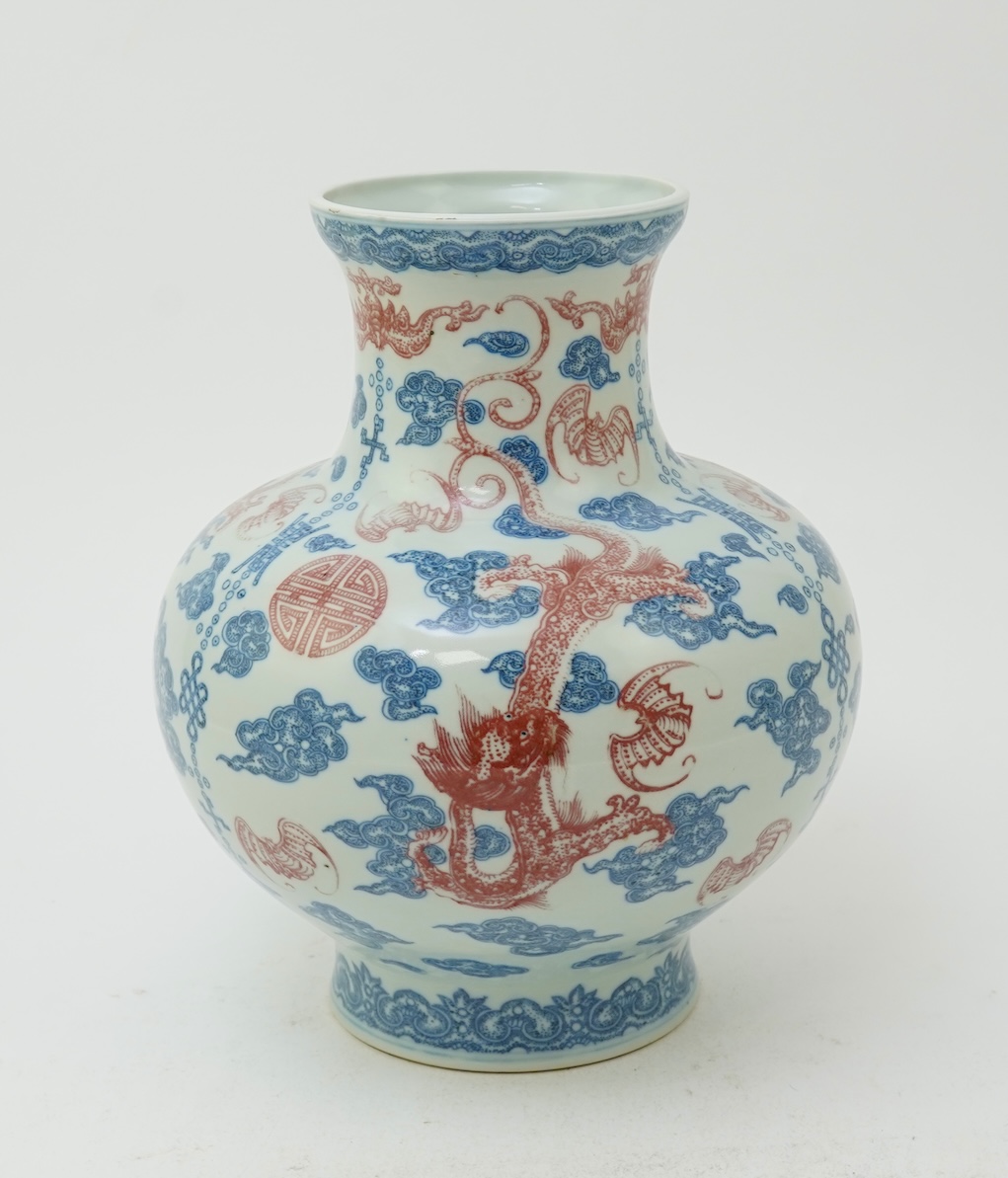 A Chinese underglaze blue and copper red ‘dragon’ vase, Qianlong seal mark but early 20th century